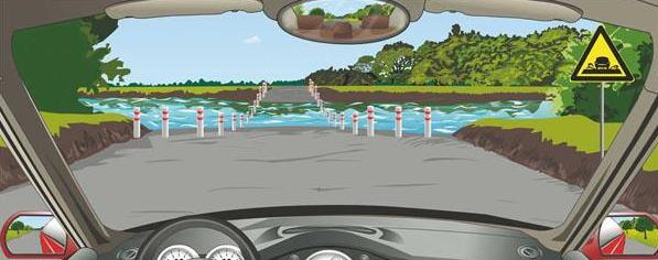 驾驶机动车遇到这种桥时首先怎样办?